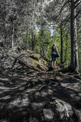 Obraz premium Young woman climbing the mountain, Alesund, Norway