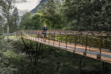 Young woman walking around the park, Norway