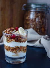 granola with nuts, berries and yoghurt for breakfast
