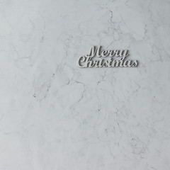 Creative arrangement of Christmas decoration on marble table. Ho