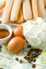 tiramisu ingredients on wooden surface