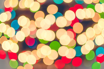 Christmas card. Bright blurred defocused Xmas lights background with copyspace, your text space.