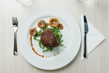 Delicious sirloin steak with green beans