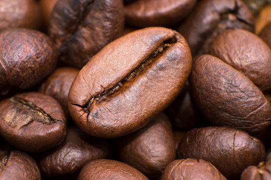 Closeup coffee beans background © Aleksei