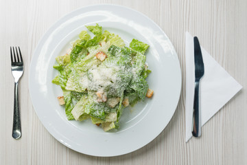 Caesar salad with cheese and croutons