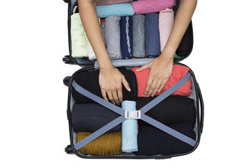 woman packing a luggage for a new journey on white background