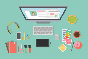 Designer desk mockup. Desk with computer screen, tablet and drawing tools.