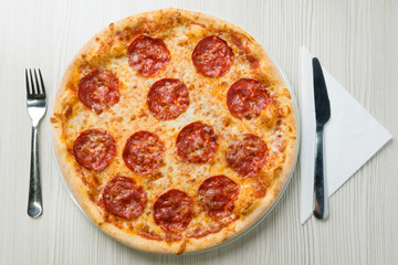 Salami pizza on the table