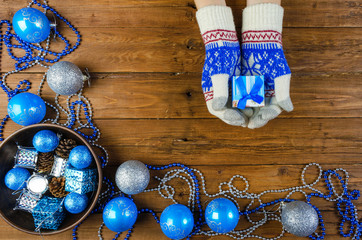 Christmas decor on a wooden table, New Year gift.