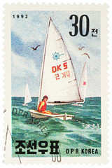 Fototapeta premium Sailboat on postage stamp