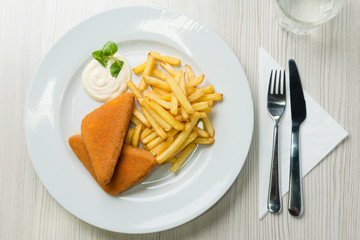 Fried cheese with french fries and tartar sauce