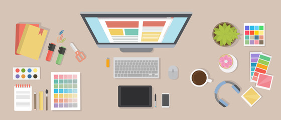 Web designer desk mockup. Desk with computer screen, tablet and drawing tools.