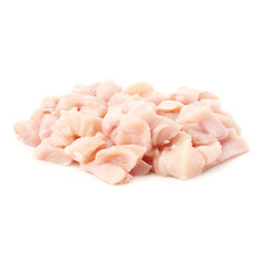 Raw chicken fillet cutted into pieces isolated over white background