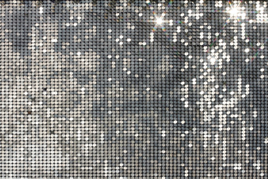 Silver background mosaic with light spots and stars © yulyao