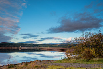 Still Water at Kielder Dam, in Kielder Water and Forest Park, Northumberland, which has the largest man made lake in Northern Europe. The reservoir sits in the North Tyne Valley