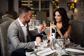 Couple celebrating in restaurant