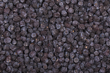 Dried blueberries in plate, close up