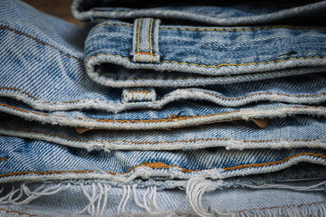 Stack of old jean, Torn and worn jean