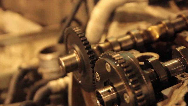 close-up exploded car engine in garage