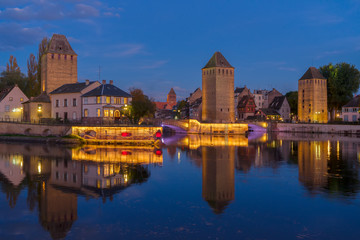 Fototapeta premium medieval bridge Ponts Couverts of Strasbourg at night, France