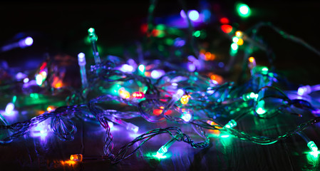 Fototapeta na wymiar Christmas garland on wooden background