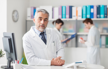 Doctor at the reception desk
