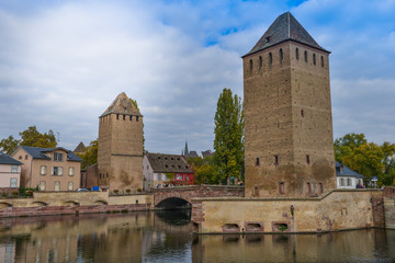 Fototapeta na wymiar Strasbourg, medieval bridge Ponts Couverts, historic district Petite France