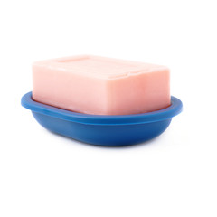 Pink soap bar isolated over white background