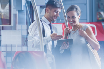 Man showing something on tablet