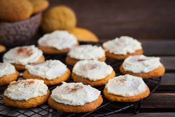 Homemade pumpkin spice cake cookies with glaze and cinnamon