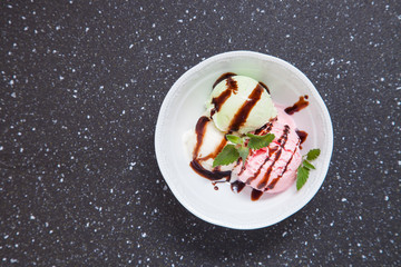ice cream in a bowl on a table, selective focus