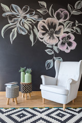 Room with chair and chalkboard