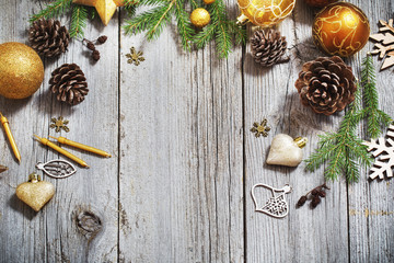 Golden decoration on old wooden background