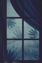 Ghost Hands on Window