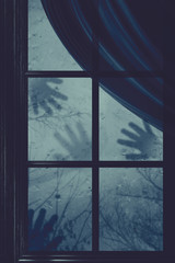 Fototapeta premium Ghost Hands on Window