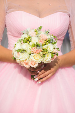 Bride with Roses in Hands