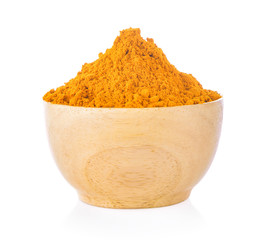 turmeric in wood bowl on white background