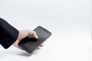 Isolated male hands holding the Smartphone