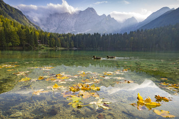 autumn over alpine lake in the Julian Alps, Italy
