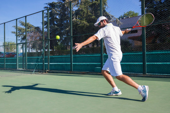 Professional Tennis Player Man Playing On Court