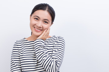 Asian woman thinking and happy isolated on white background