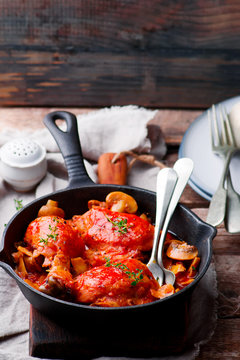Marengo chicken in a frying pan. . selective focus