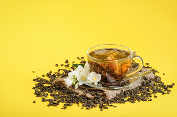 Cup of jasmine tea with flowers