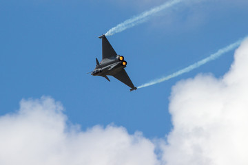 Fighter Jet flying away from camera