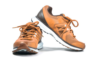 Colorful orange running and fashion sneaker shoes isolated on white background.