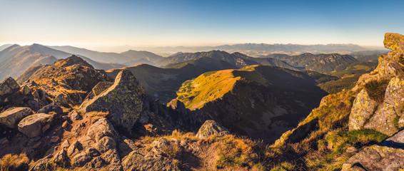 Evening Mountain Landscape with Rocks in Foreground. View from Mount Dumbier in Low Tatras National Park Towards High Tatras Mountains in Slovakia.