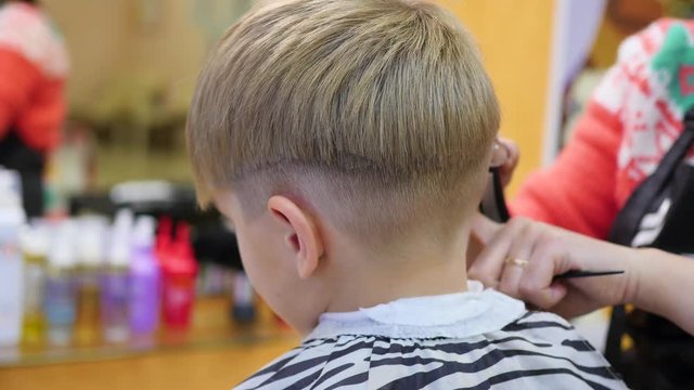 child's haircut at the Barber shop