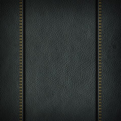 Texture of grey leather background with stitched seam, close-up. Texture for design.