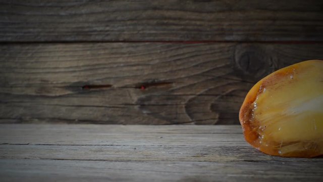 fresh natural kaki fruits on wooden table