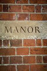 Manor carved sign at English grand residence